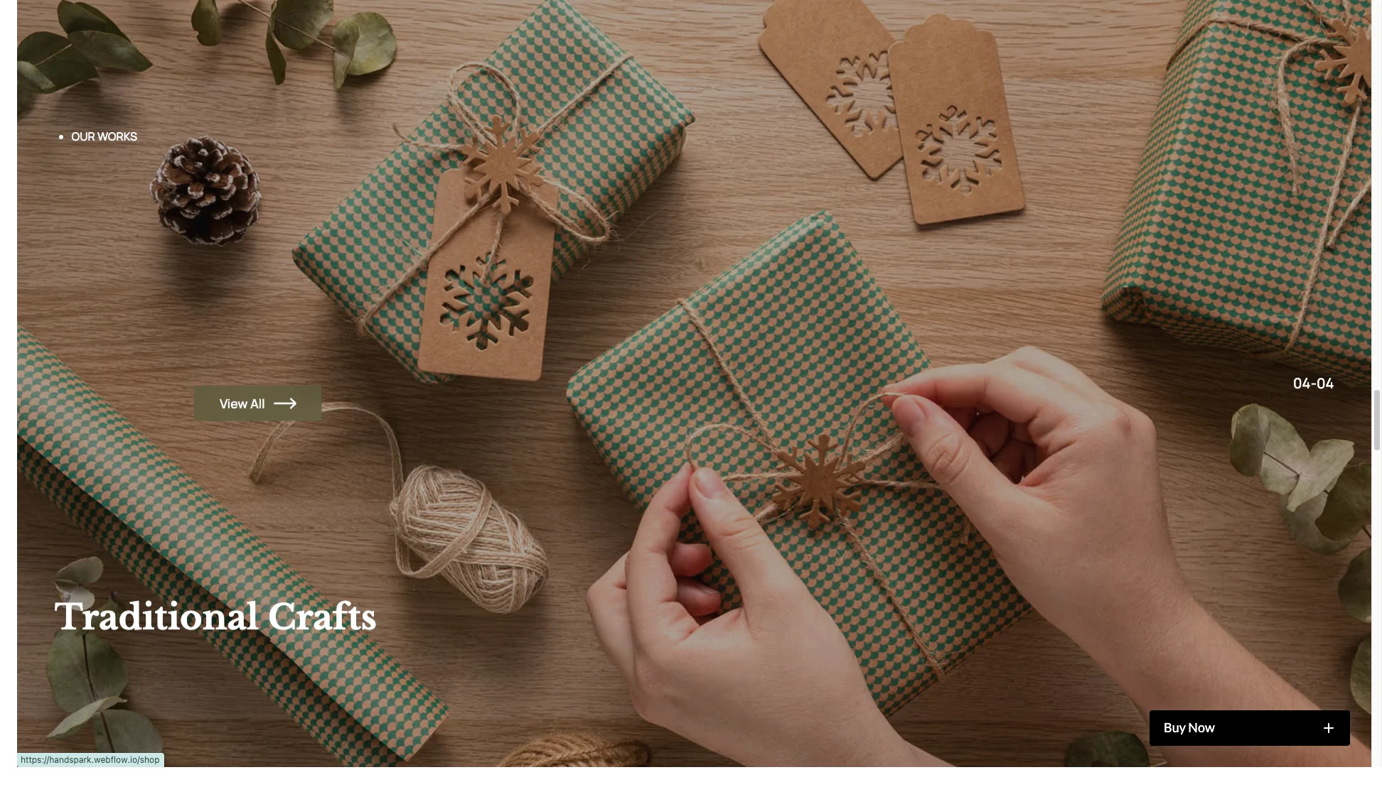 GSAPPowered Hero Animations - TNCFlow Hands tying twine around a gift wrapped in teal patterned paper on a wooden table.